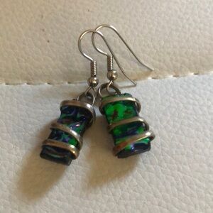 Beautifully unique dangling earrings with tones of blue and green black